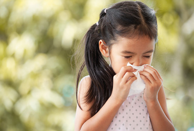 Allergies: Girl Sneezing